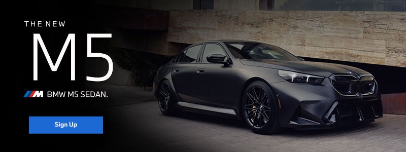 New BMW M5 Sedan parked.