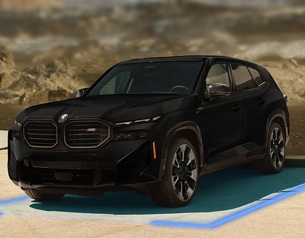 BMW XM Interior shot & Exterior XM driving with Active Driving Assistant and Parking Assistant Plus BMW Showcase 1 in Derwood MD