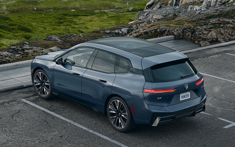 The BMW iX parked in a parking spot. | BMW Showcase 1 in Derwood MD