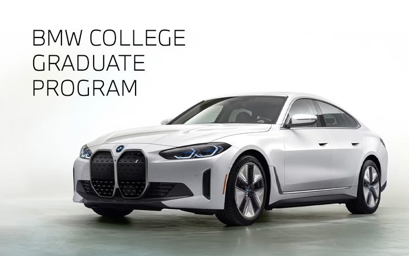 White BMW i4 parked. BMW College Graduate Program. | BMW Showcase 1 in Derwood MD